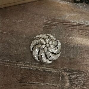 Silver flower brooch